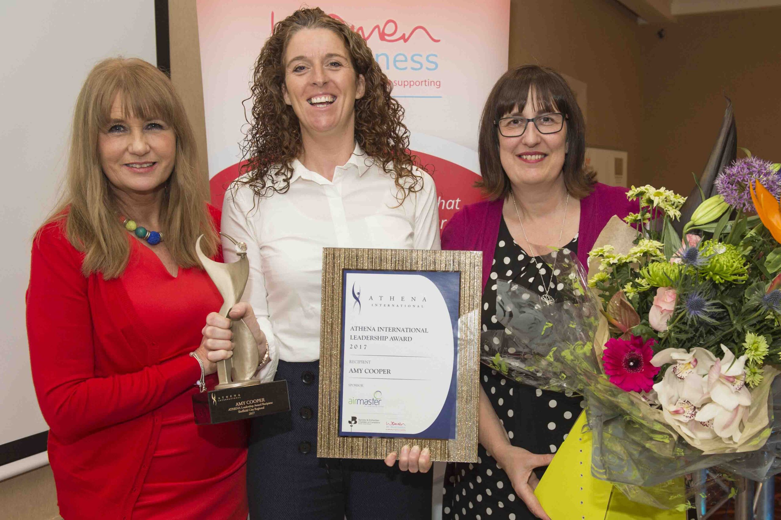 Jackie Freeborn, Amy Cooper, Recipient of the ATHENA International Award and Lisa Pogson President of the Chamber