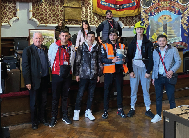 Ex miner Peter Davies with Barnsley College English for Speakers of Other Languages (ESOL) students in the Barnsley Miners’ Hall on Victoria Road.